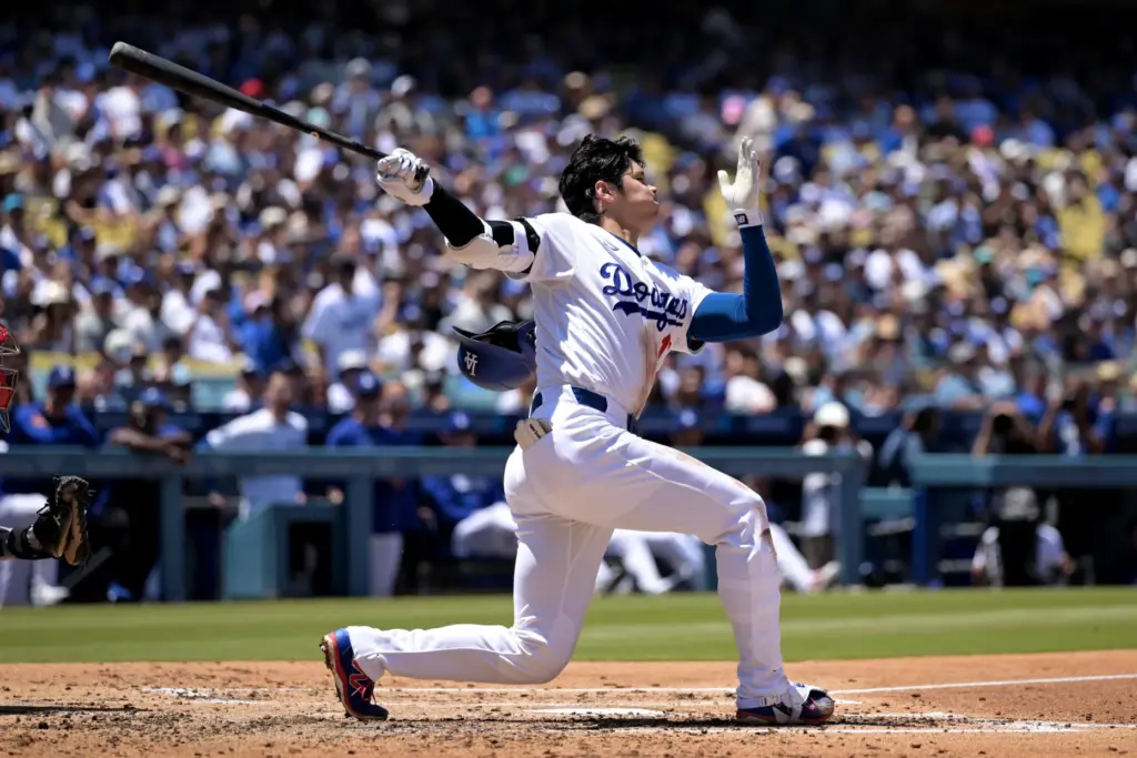 Dodgers’ Shohei Ohtani strikes out during the second inning of...