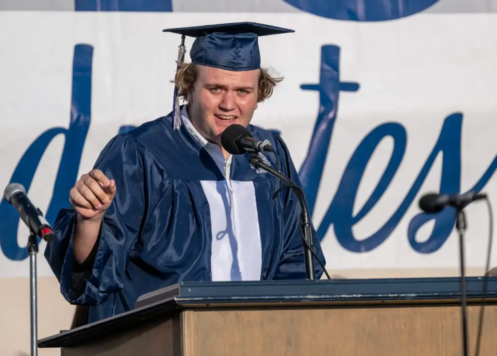 Grant Jacobson delivers the student address during the graduation ceremony...