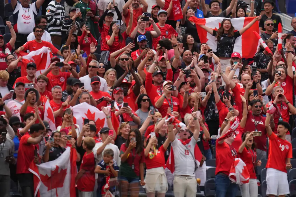 Cabadian fans celebrate after the World Cup round of 32...