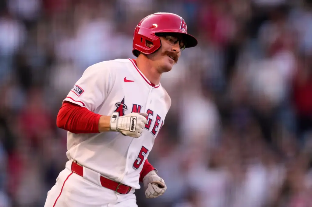The Angels’ Wade Meckler runs the bases after hitting a...