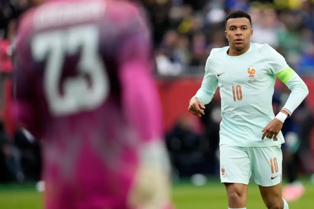 FILE – Kylian Mbappe of France runs during the international...