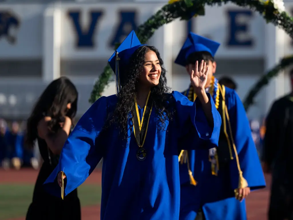 Graduate Jazlyn Cruz enters Bradford Stadium for the Valencia High...
