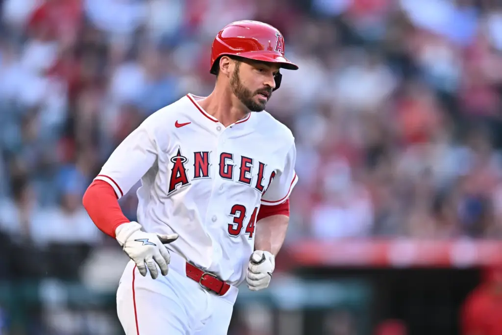 The Angels’ Trey Mancini runs after hitting an RBI single...