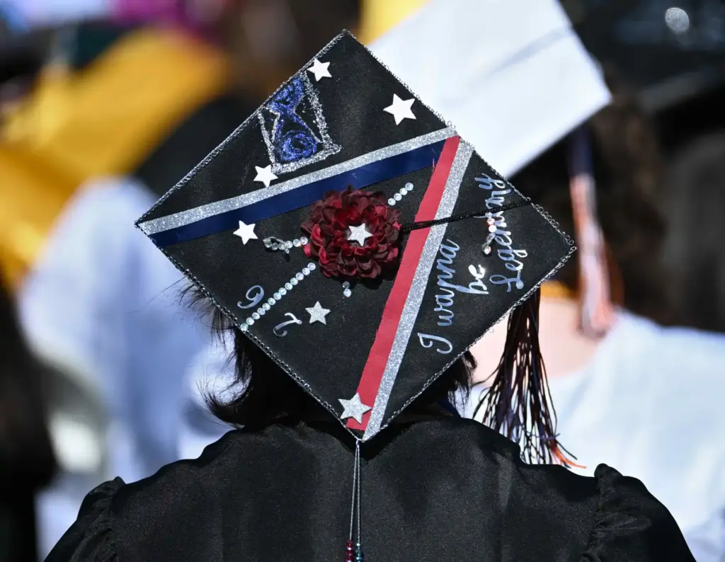 Huntington Beach High School graduates show their creativity by decorating...