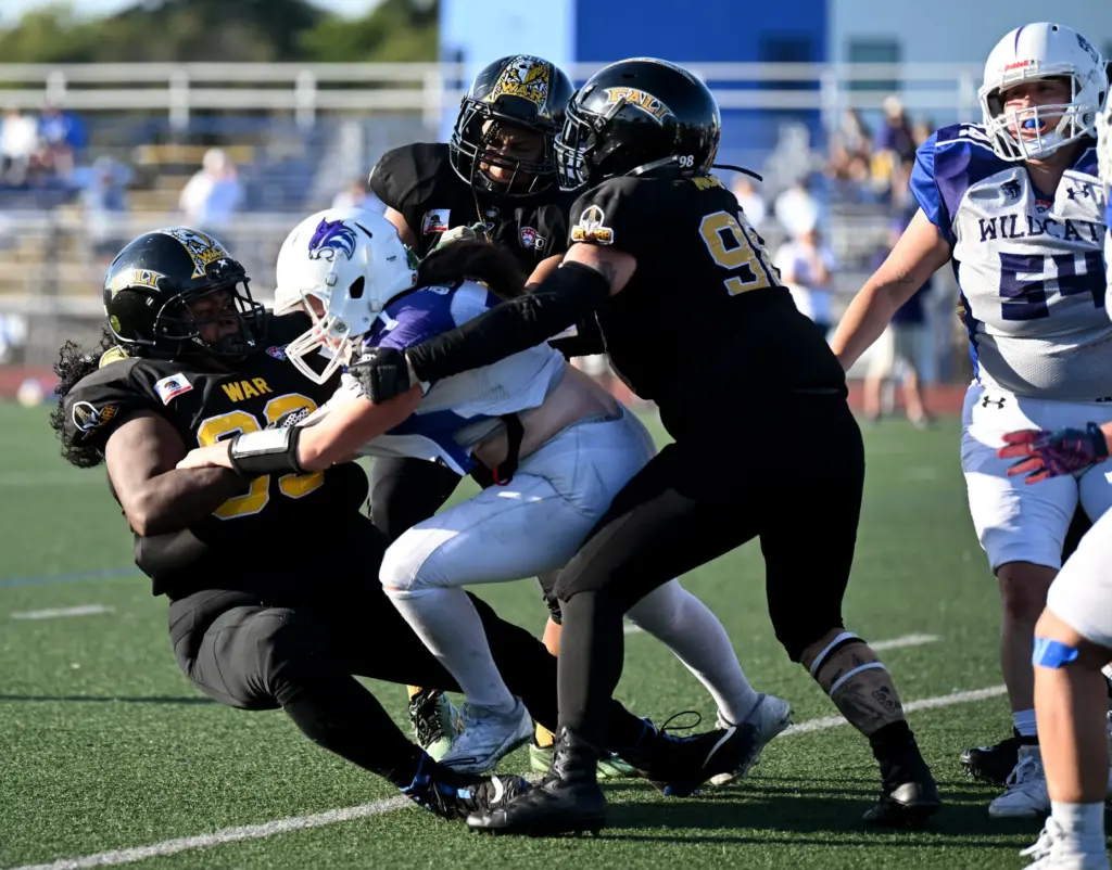 The CaliWar women’s football team defense takes down a Salt...