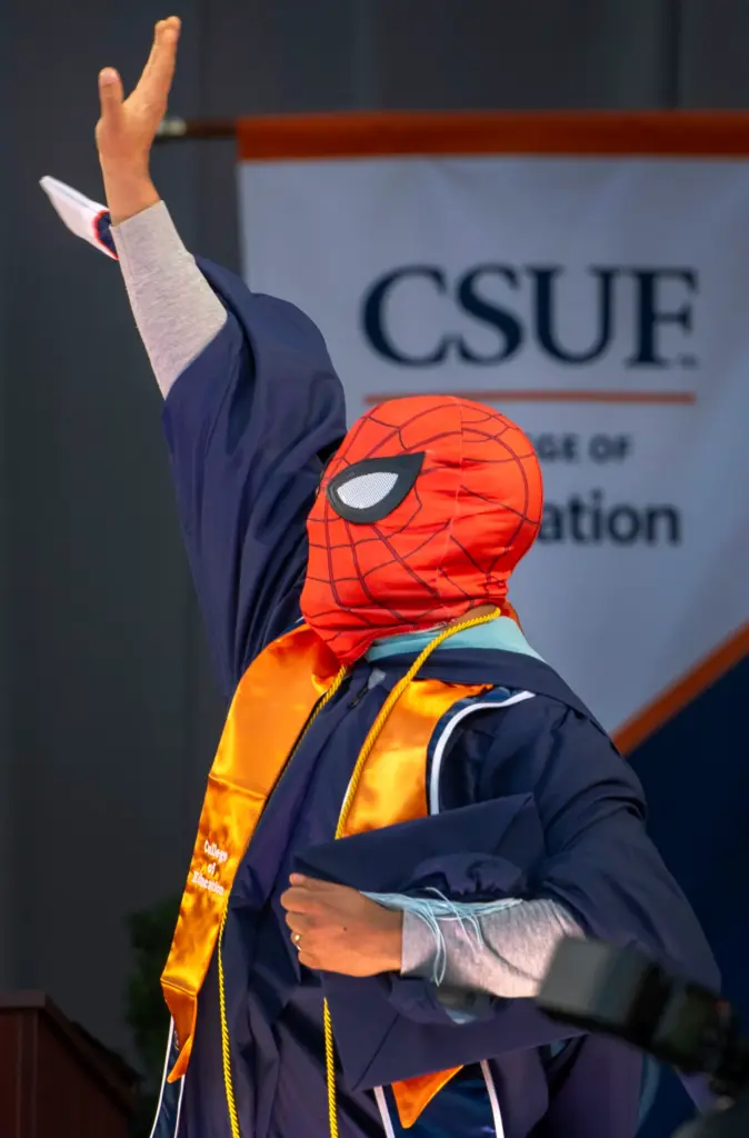 Spiderman, aka Manual Zarate received his diploma during CSUF College...