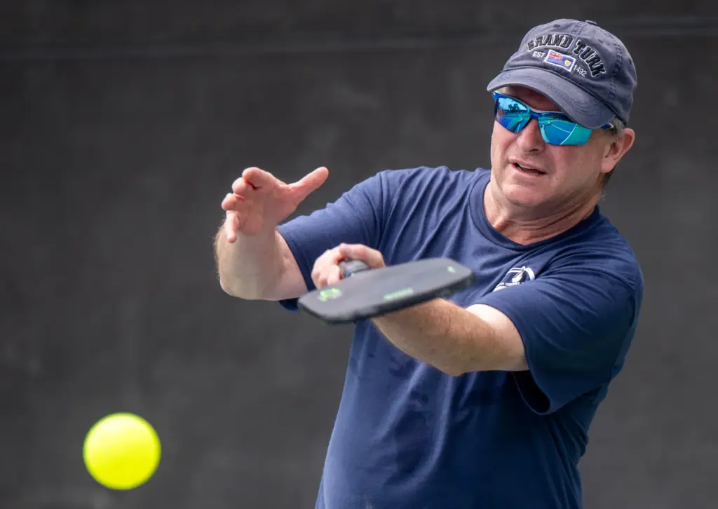 Mark Koester of Mission Viejo hits the ball while competing...