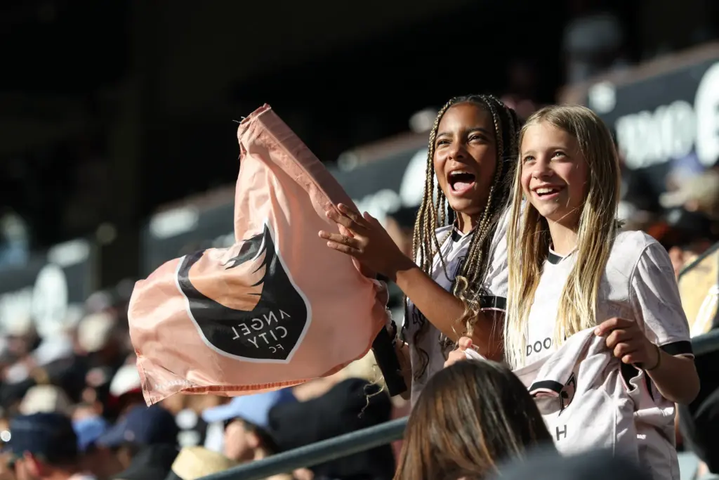 Fans cheer during the second half of an NWSL match...