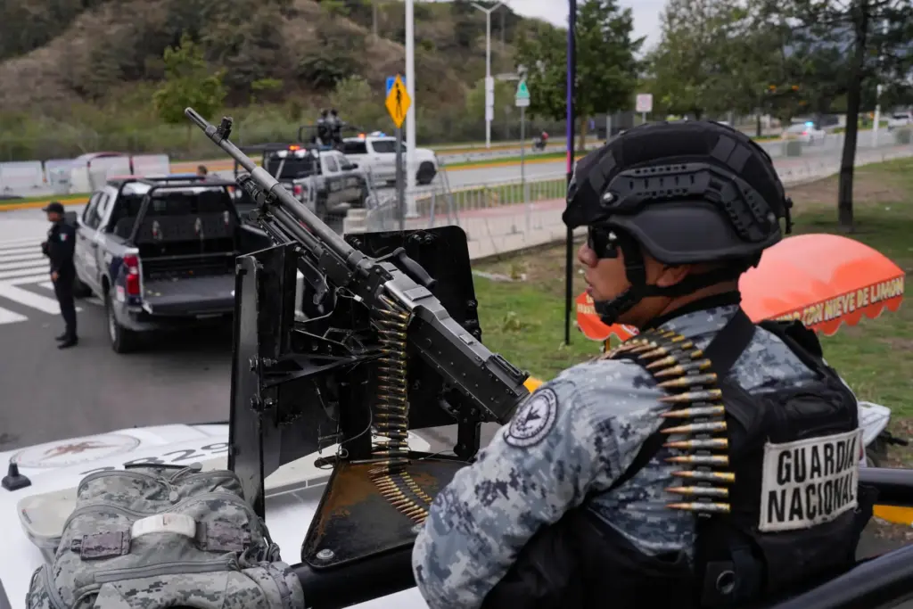 National Guard troops stand guard outside the stadium that will host World Cup matches in Guadalajara.
