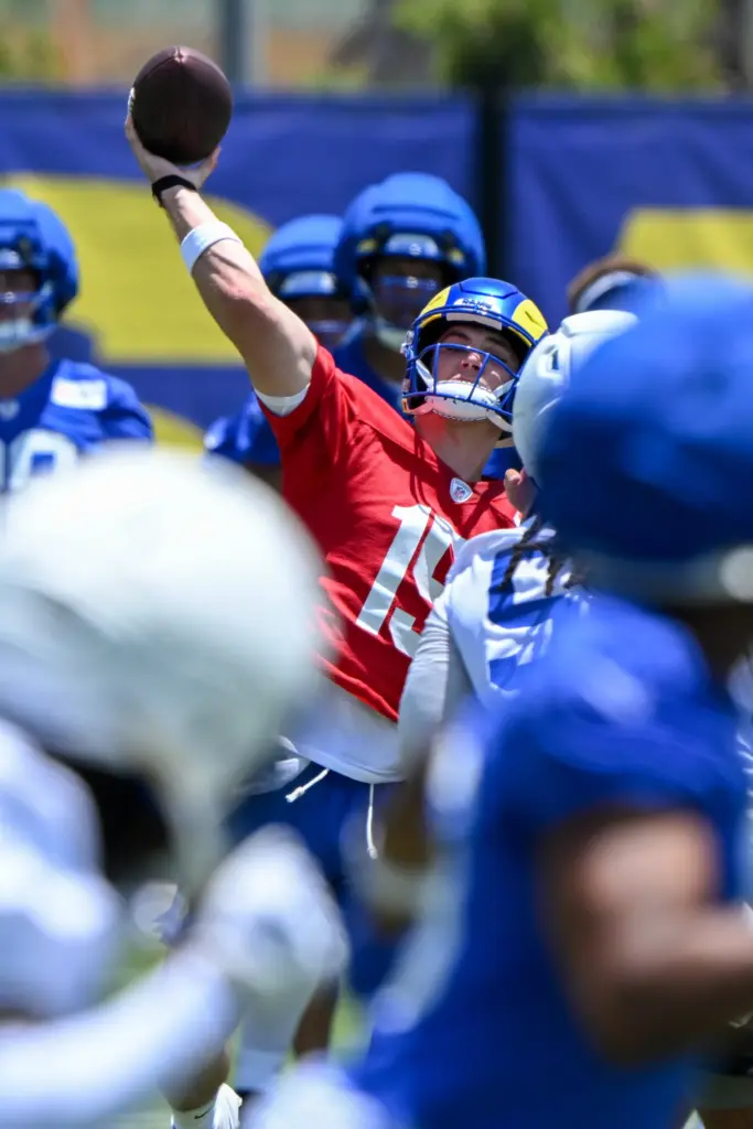 Rams rookie quarterback Ty Simpson throws downfield during an OTA...