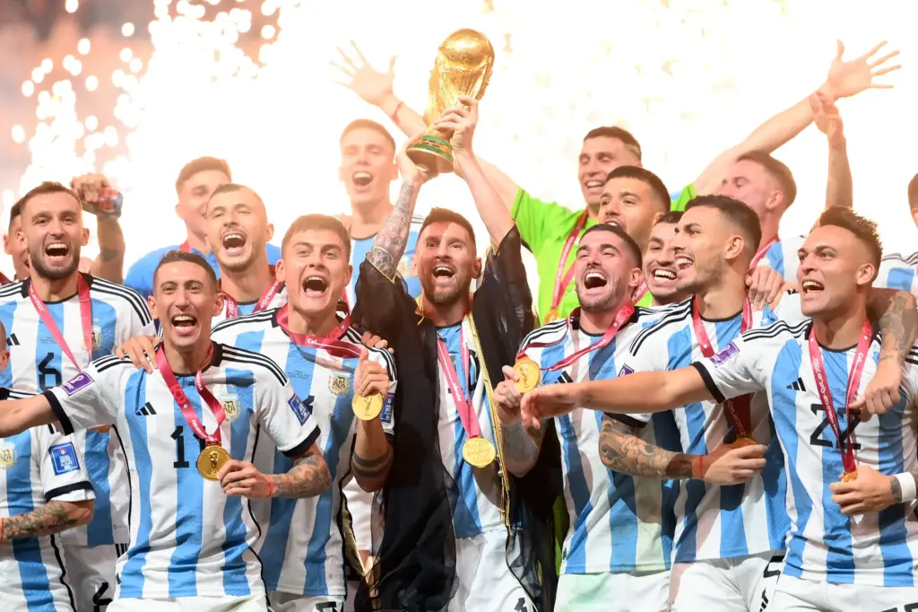 Lionel Messi of Argentina lifts the FIFA World Cup Qatar...