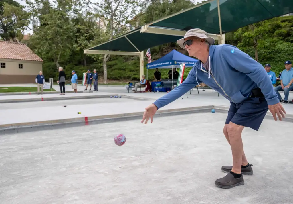 Richard Ruhl of Laguna Woods takes his turn tossing a...