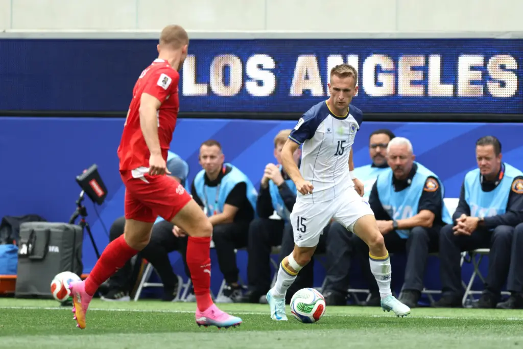 Bosnia and Herzegovina midfielder Amar MemiÄ (15) controls the ball...