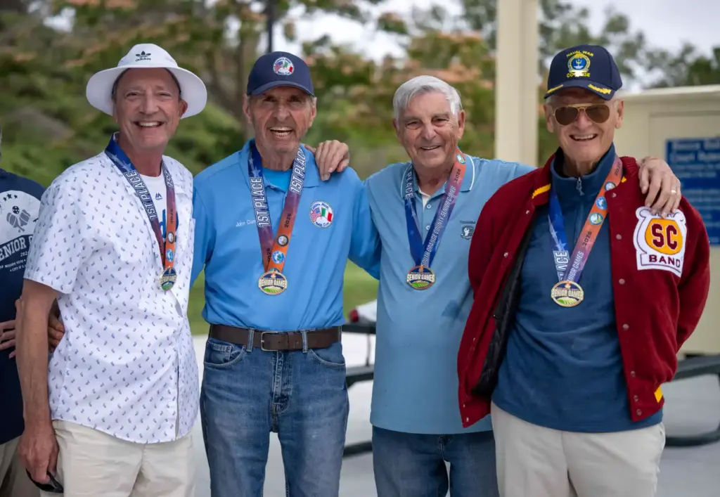 Bocce ball champions Steve Cryan of Mission Viejo, John Cummings...