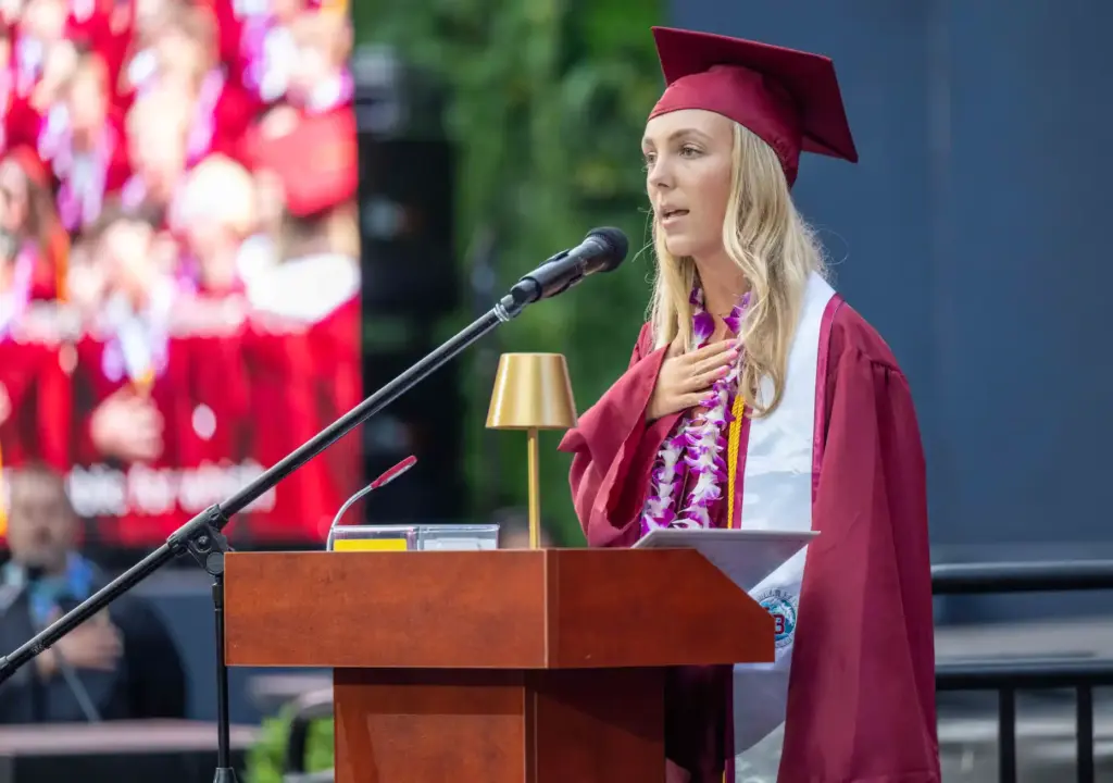 Kaia Gamber leads the Pledge of Allegiance during the Laguna...