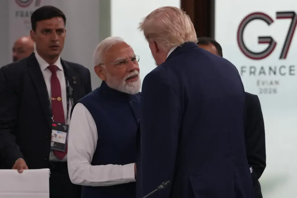 India’s Prime Minister Narenda Modi shakes hands with U.S. President...