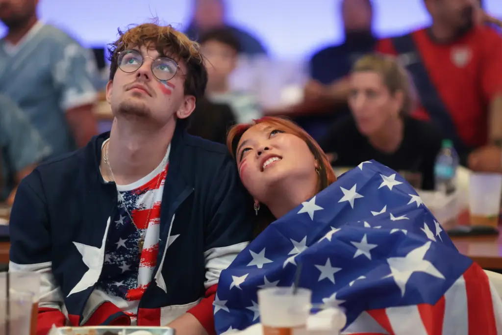 Fans react during a watch party of the World Cup...