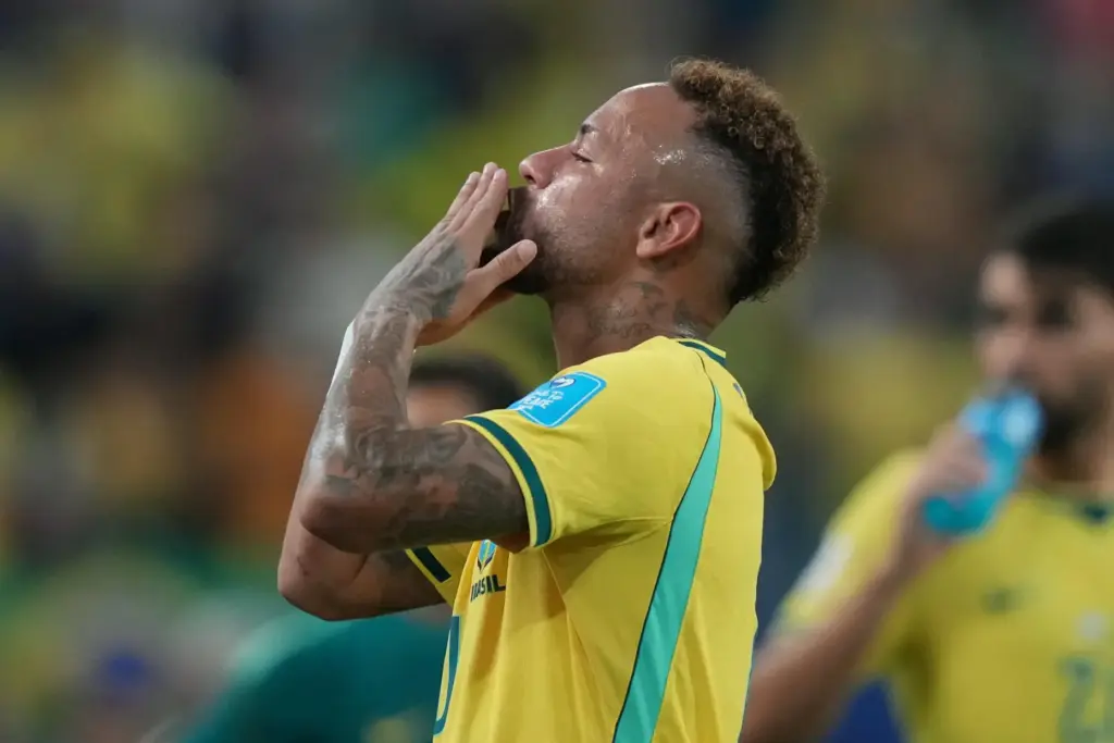 Brazil’s Neymar (10) celebrates after the World Cup Group C...