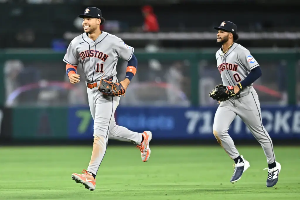 Houston Astros right fielder Cam Smith, left, and center fielder...