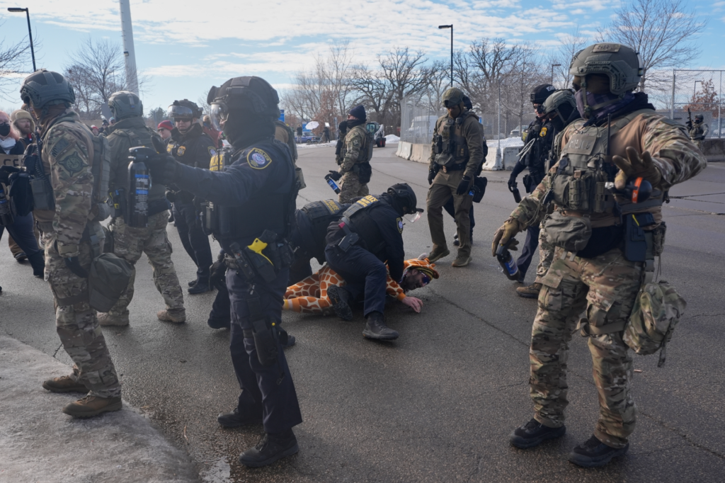 FILE – Protesters demonstrate against Immigration and Customs Enforcement (ICE)...