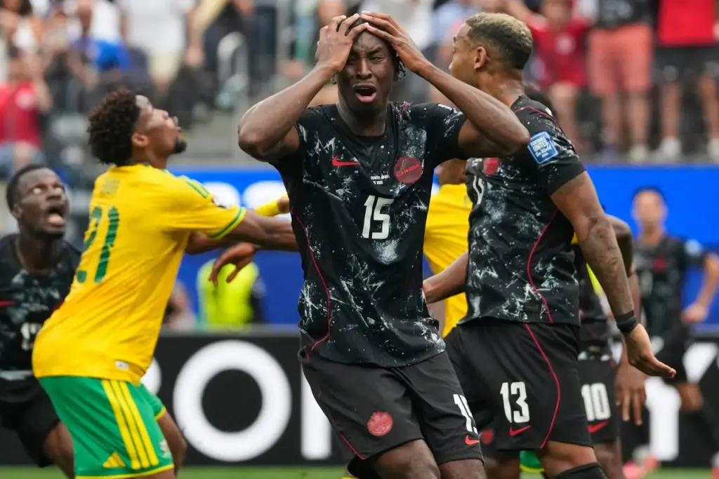 Canada’s Moise Bombito reacts during the World Cup round of...