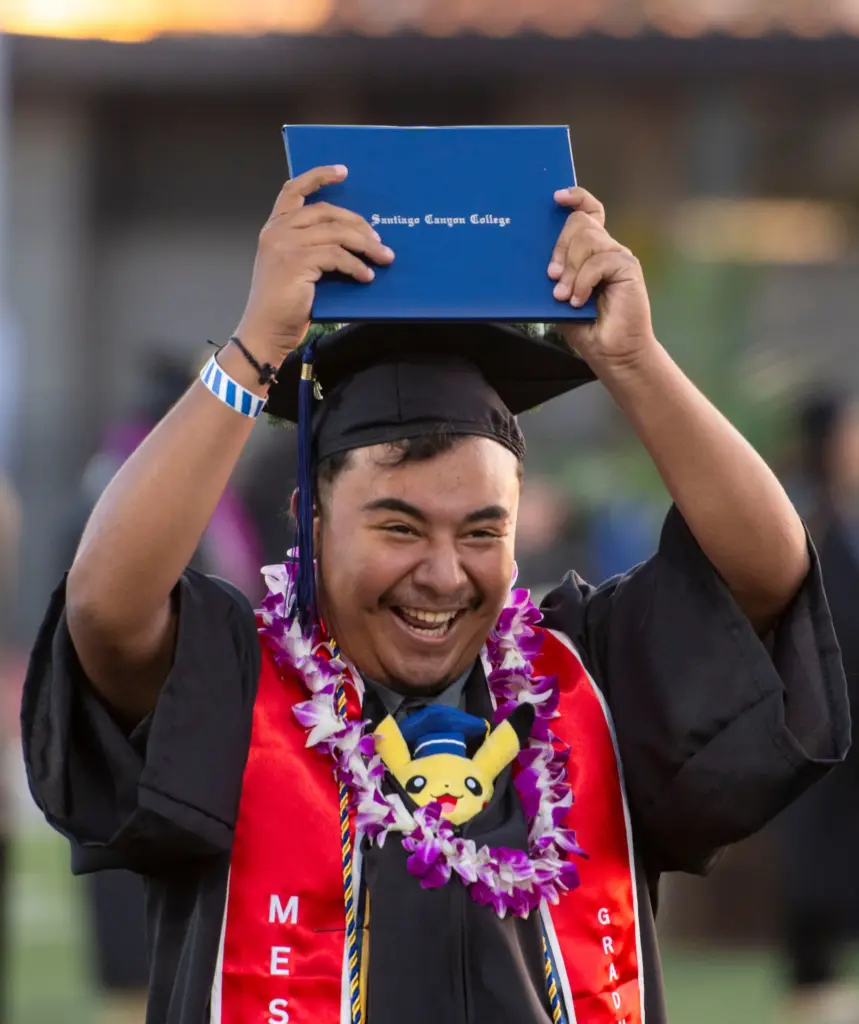 A graduate was all smiles after receiving his diploma at...
