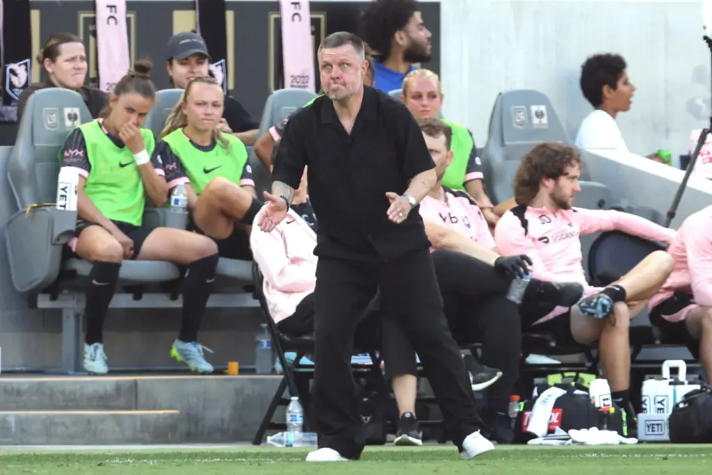 Angel City FC head coach Alexander Straus react against the...