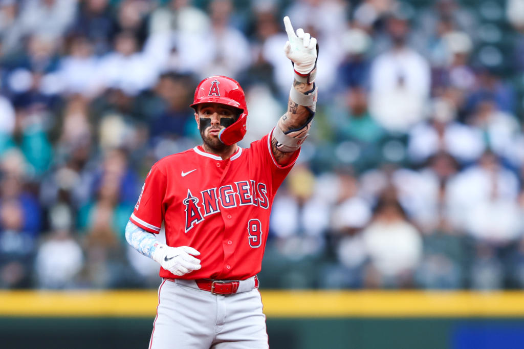 The Angels’ Zach Neto celebrates after hitting a double during...