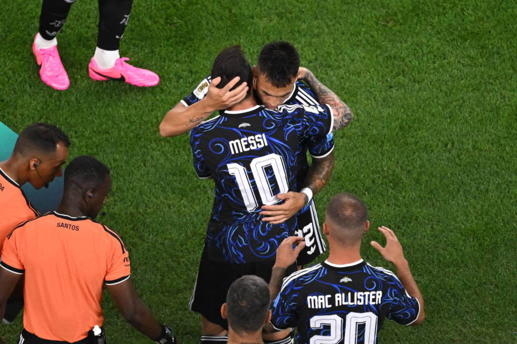 Argentina’s Lautaro Martinez (22) is substituted by Lionel Messi (10)...