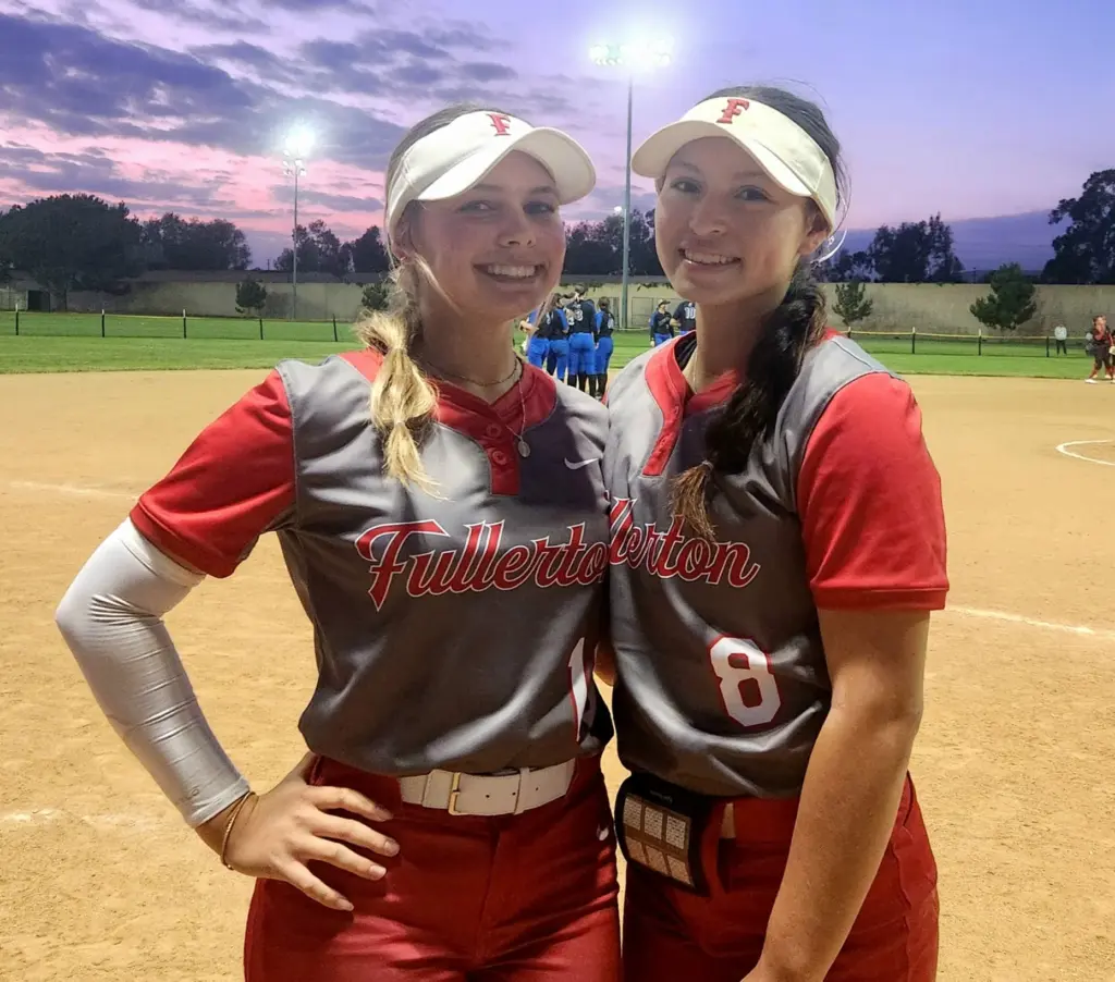 Fullerton’s Hayley Brock, left, hit a three-run home run and...