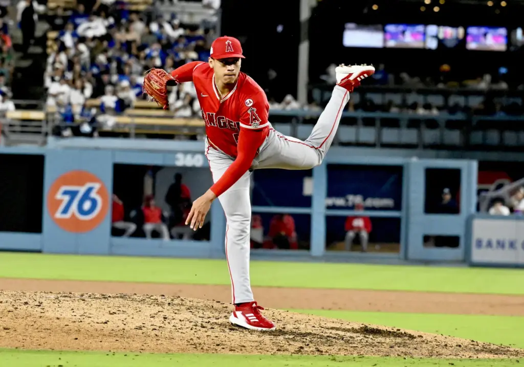 Relief pitcher Samuel Natera Jr. #52 of the Angels makes...