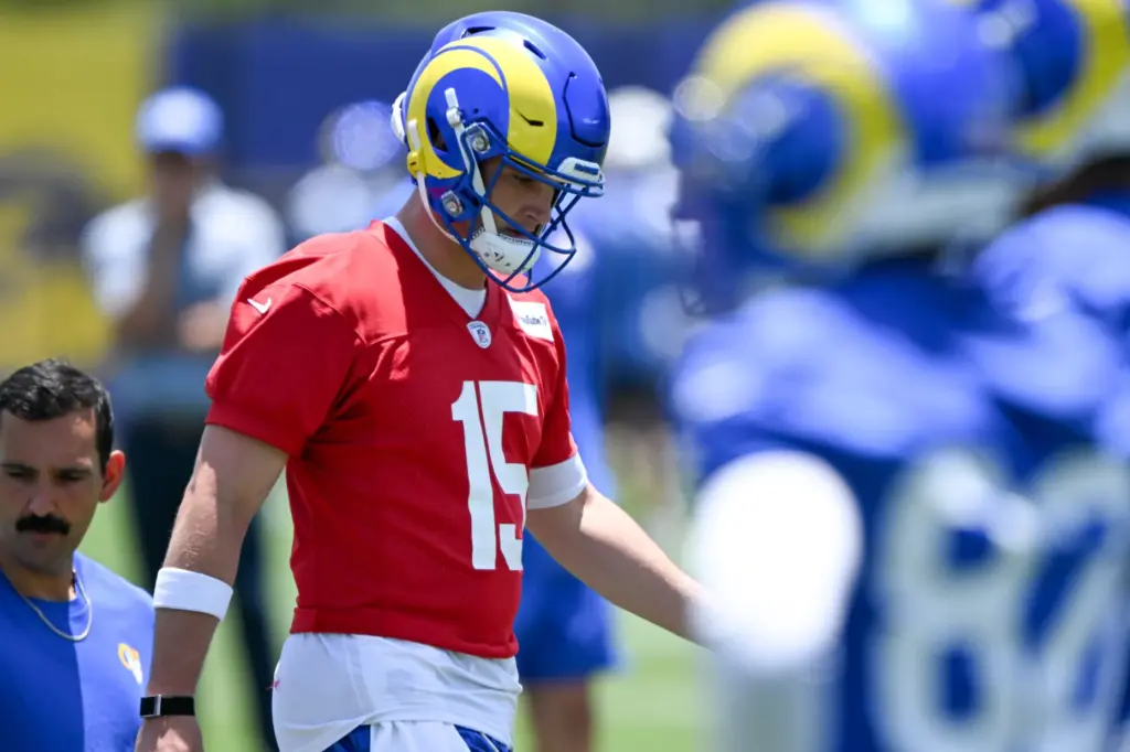 Rams rookie quarterback Ty Simpson walks on the field during...