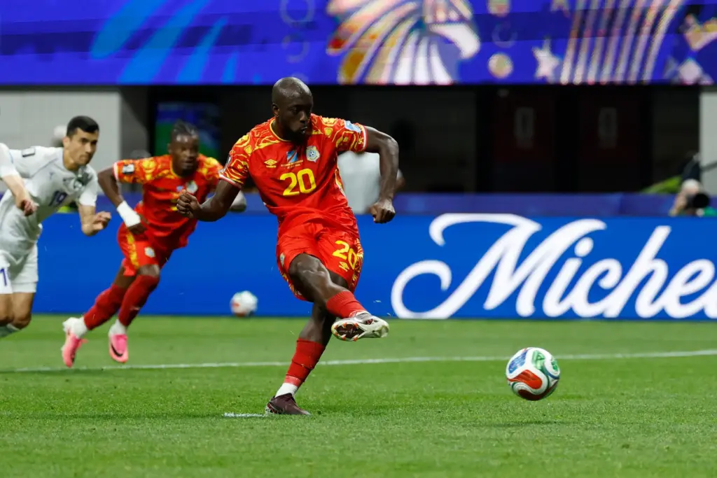Congo’s Yoane Wissa (20) kicks for a penalty kick goal...