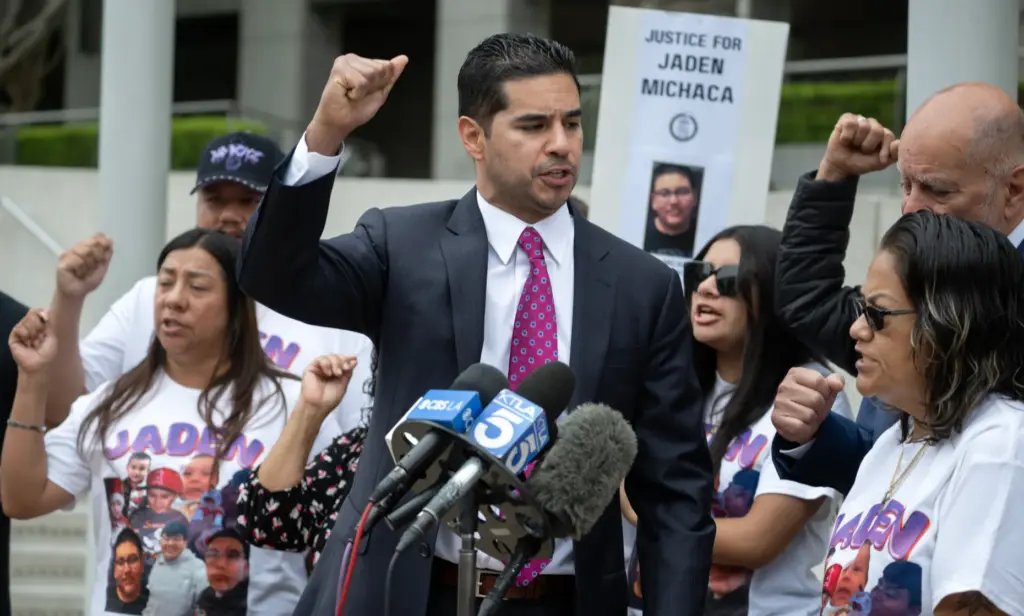 Attorney Michael S. Carrillo leads the chant, âJustice for Jayden!