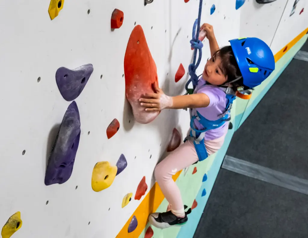 Cassie Ni climbs during Rock Climbing Camp at Sender One...