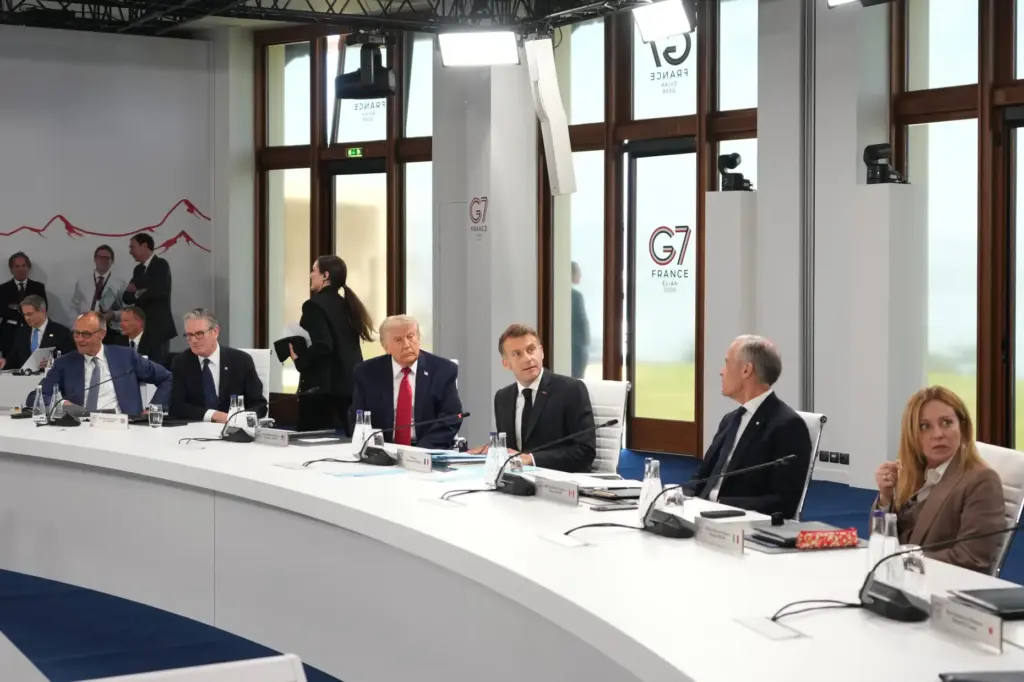 G7 leaders sit around a table.