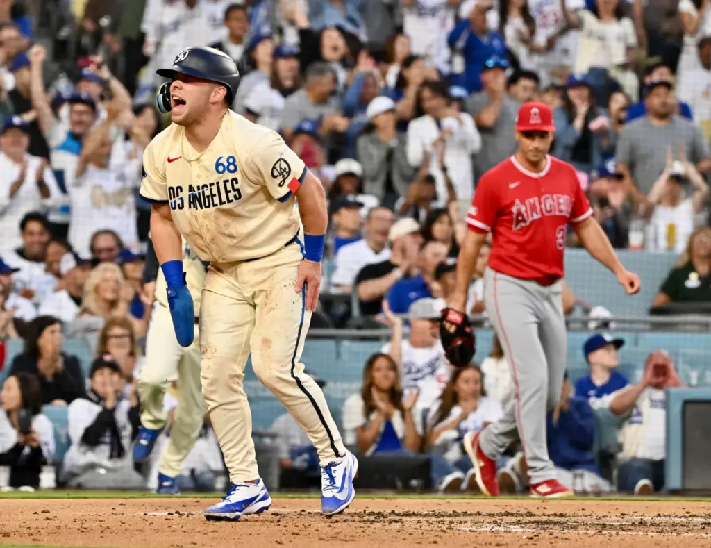 Daulton Rushing #68 of the Dodgers scores on a double...