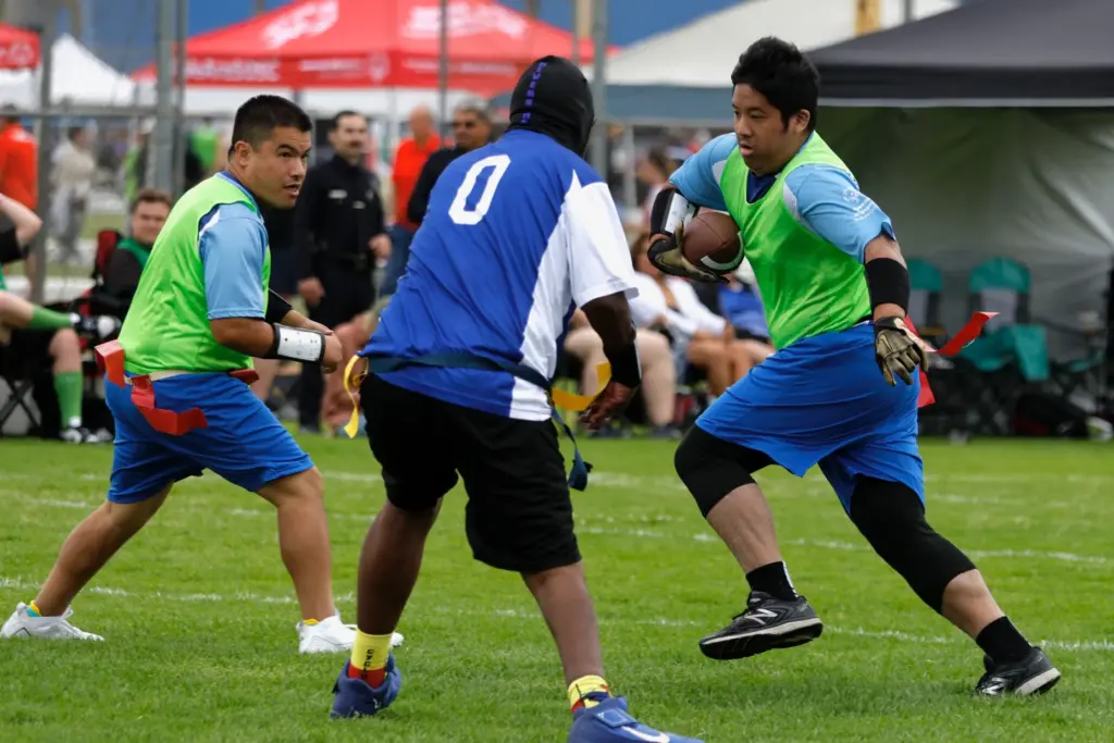 A runner for the Laguna Hills Hawks picks up yards...