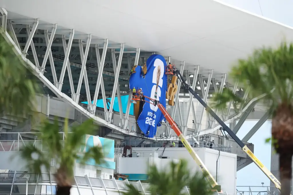 Workers cover Hard Rock Stadium signage with World Cup 2026...