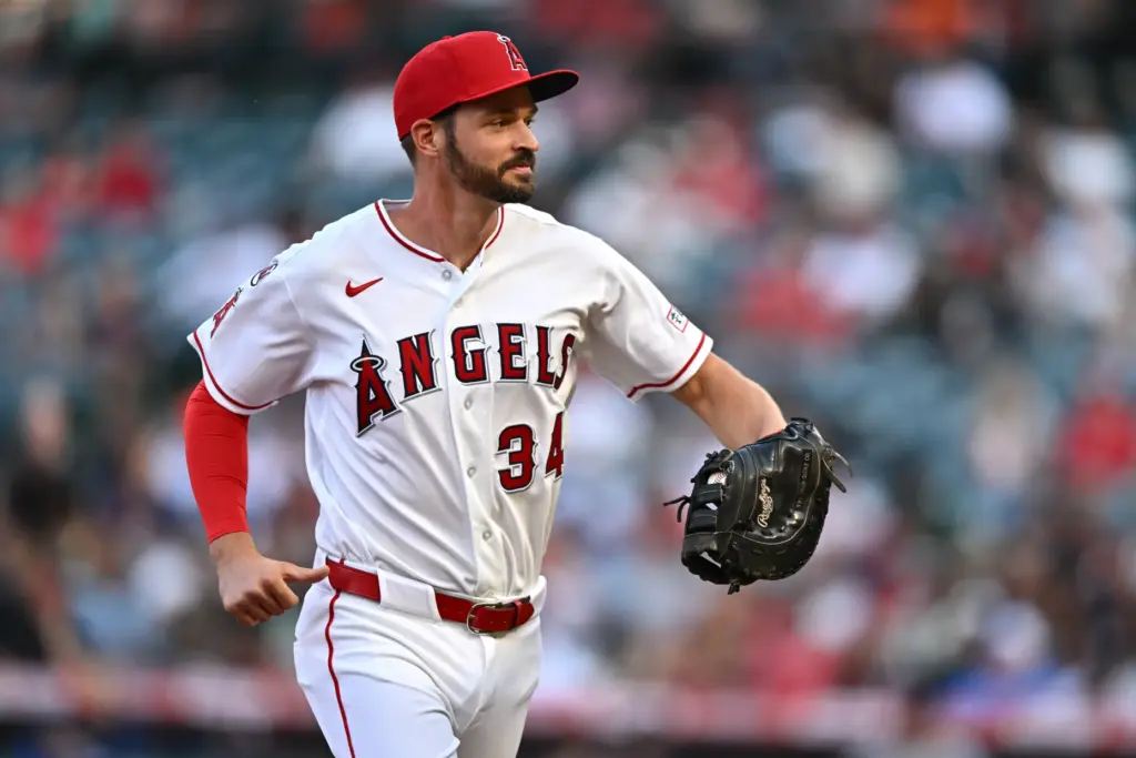 Angels first baseman Trey Mancini runs off the field after...