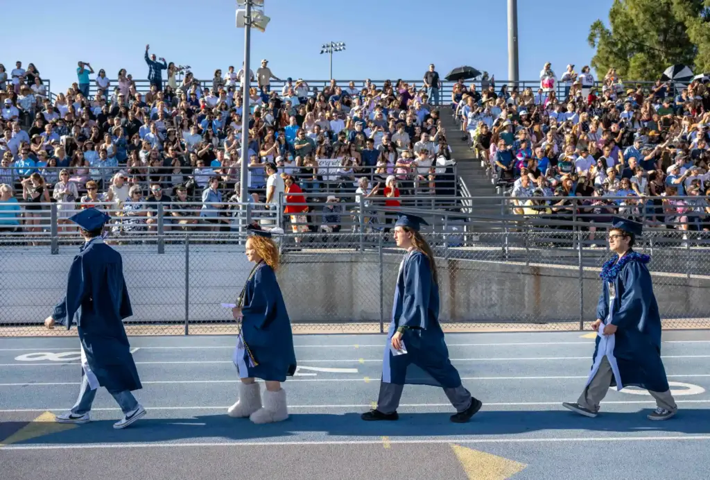Members of Trabuco Hills High Schoolâs class of 2026 file...