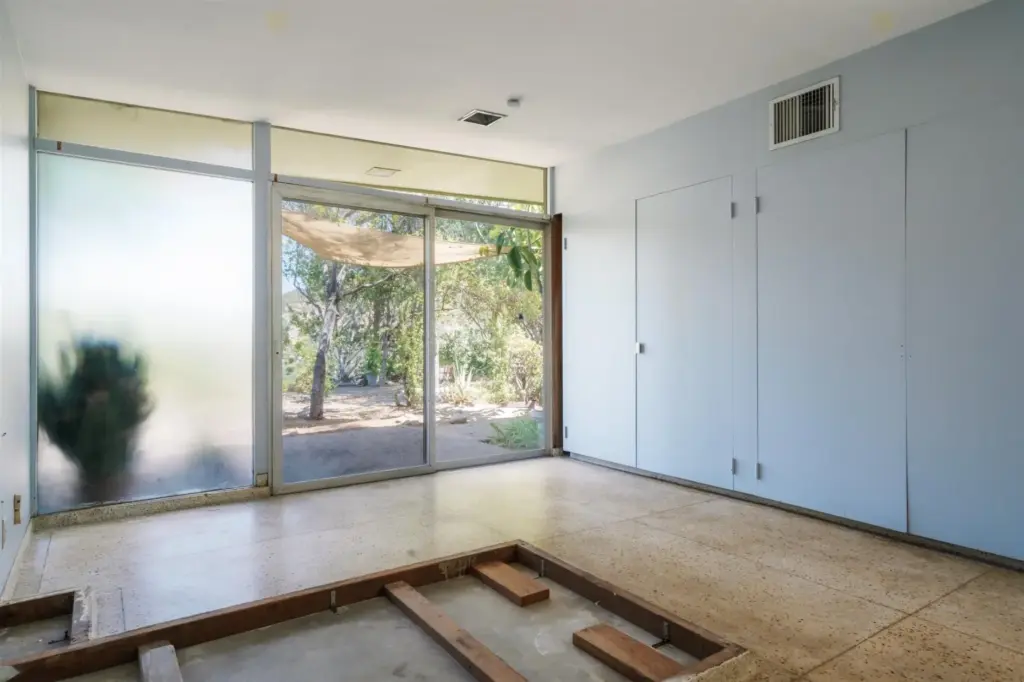Original built-in features, such as a bed platform in one...