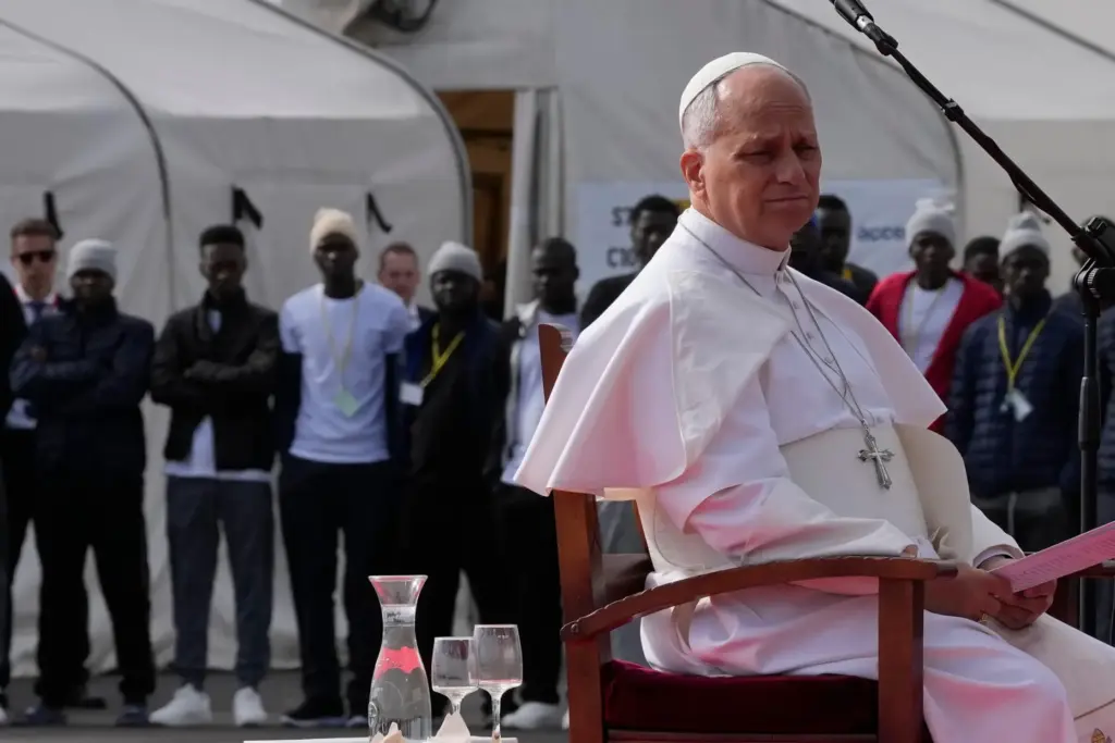 Pope Leo XIV attends a meeting with migrants at the 'Las Raices' center.