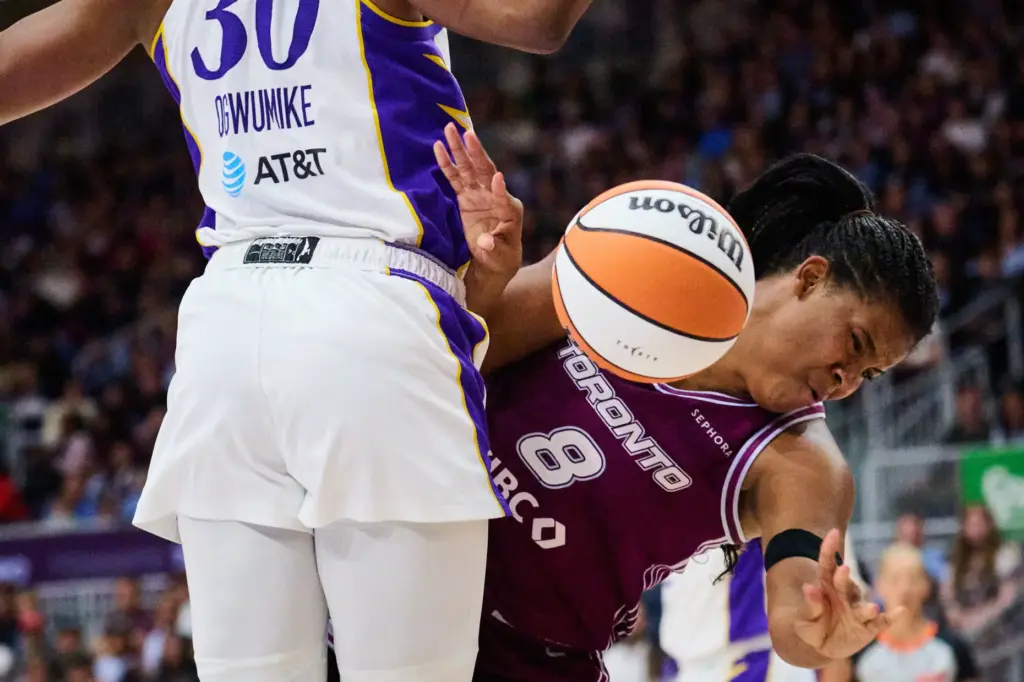 The Toronto Tempo’s Nyara Sabally (8) hits the Sparks’ Nneka...