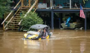 Tropical storm remnants pound Gulf states with heavy rain after tornadoes hit the Midwest
