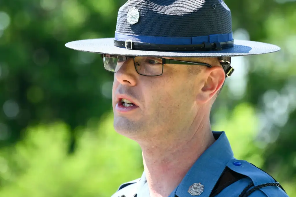 Missouri State Highway Patrol Sergeant Justin Ewing talks to the media.