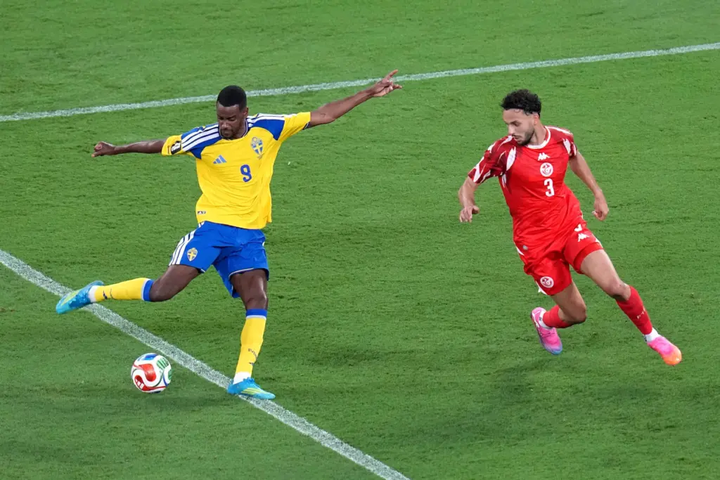 Sweden’s Alexander Isak (9) shoots and scores their second goal...