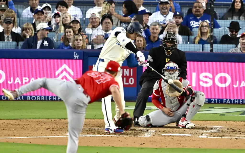 Shohei Ohtani #17 of the Dodgers hits a two run...