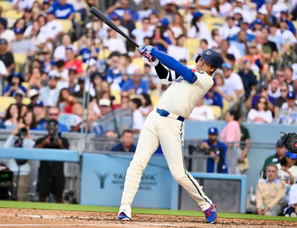 Shohei Ohtani of the Dodgers singles against the Arizona Diamondbacks...