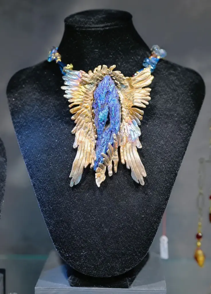 Sheri Cohen designs and makes jewelry, including intricate necklaces made...